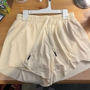 Cream layered wrap athletic short
